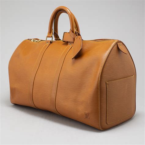 louis vuitton keepall 45 bandouliere review|louis vuitton epi keepall 45.